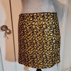 Le Superbe shimmery leopard mini skirt. Size 4